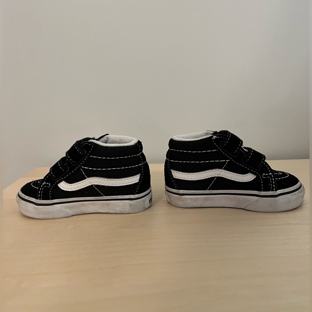 Toddler size 4 vans high tops. Worn maybe 5x.
